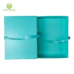 Wholesale Custom skin care Packaging Magnet Flip Box with blue ribbon