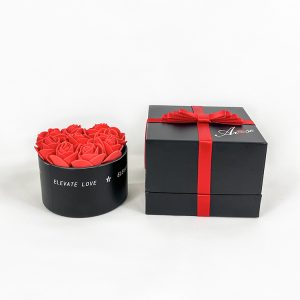 Happy Valentine’s Day gift packaging black paper cardboard box with ribbon ornament outside